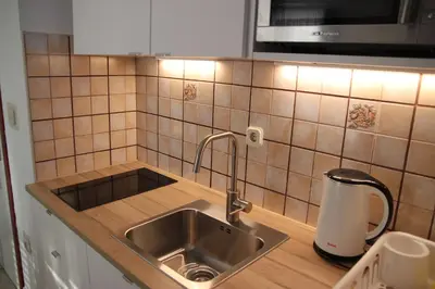 Kuhinja ili čajna kuhinja u objektu Apartments Time Off