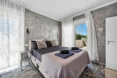 Krevet ili kreveti u jedinici u objektu Luxury villa with a swimming pool Sibenik - 21484