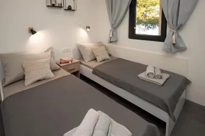 Krevet ili kreveti u jedinici u objektu Beachfront Bliss - Vortex4BB