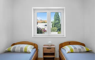 Krevet ili kreveti u jedinici u objektu Pet Friendly Apartment In Rogoznica