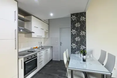 Kuhinja ili čajna kuhinja u objektu Apartments Blatančić