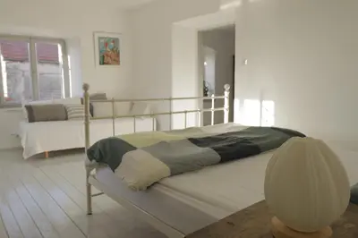 Krevet ili kreveti u jedinici u objektu Light filled spacious penthouse in Šibenik city centre