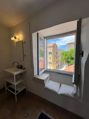 Krevet ili kreveti u jedinici u objektu Light filled spacious penthouse in Šibenik city centre