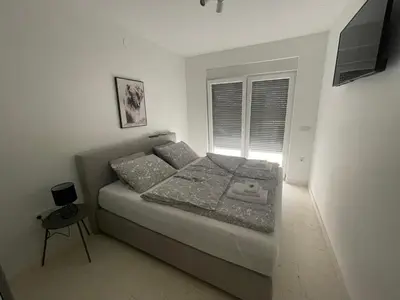 TV i/ili zabavni centar u objektu Apartment Lina
