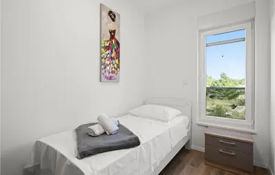 Krevet ili kreveti u jedinici u objektu 4 Bedroom Awesome Home In Srima