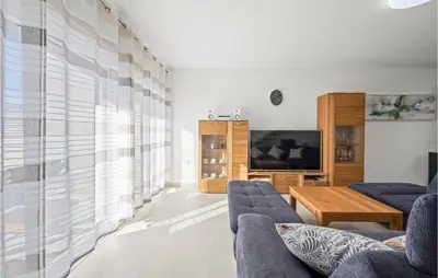 TV i/ili zabavni centar u objektu 4 Bedroom Awesome Home In Srima