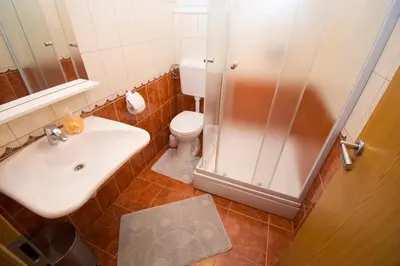 Kupaonica u objektu Apartments AS