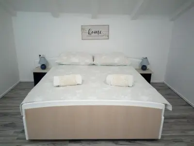 Krevet ili kreveti u jedinici u objektu Sunny Stretto apartments
