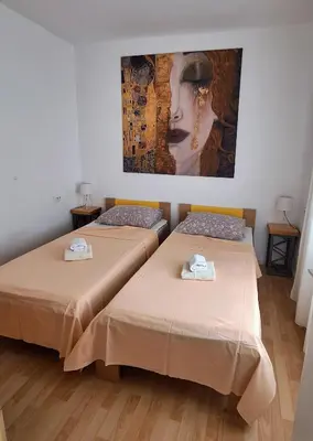 Krevet ili kreveti u jedinici u objektu Sunny Stretto apartments