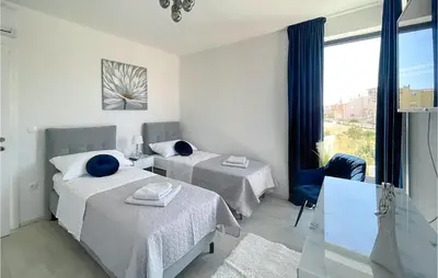 Krevet ili kreveti u jedinici u objektu Awesome Home In Vodice With Sauna