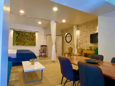 TV i/ili zabavni centar u objektu Harbour View House Studio Apartment