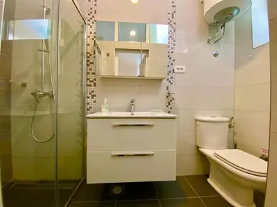Kupaonica u objektu Harbour View House Studio Apartment