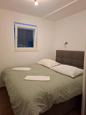 Krevet ili kreveti u jedinici u objektu Apartments Crljen