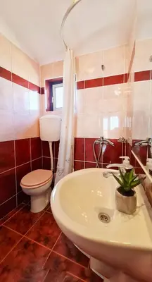 Kupaonica u objektu Apartments Crljen