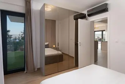 Krevet ili kreveti u jedinici u objektu NEW ! Villa Palm Bay 1 & 2 with two heated pool - near sea
