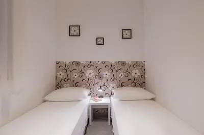 Krevet ili kreveti u jedinici u objektu Apartments Lanterna