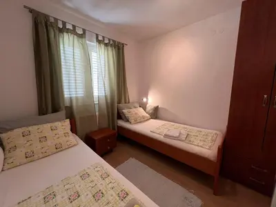 Krevet ili kreveti u jedinici u objektu Apartmani 4 Delfina Rogoznica