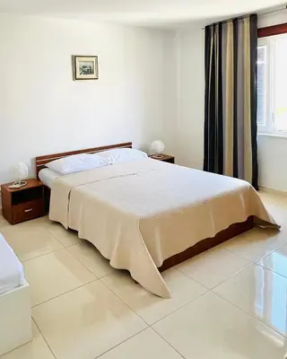 Krevet ili kreveti u jedinici u objektu Apartment Udovičić