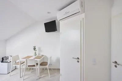 TV i/ili zabavni centar u objektu Apartmani R A M L J A K - Sobe, Zimmer, Rooms Marko