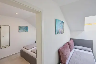 Krevet ili kreveti u jedinici u objektu Apartmani R A M L J A K - Sobe, Zimmer, Rooms Marko