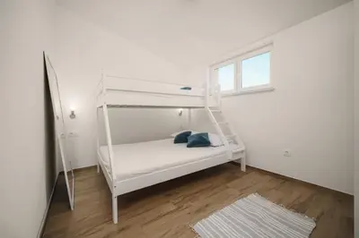 Krevet ili kreveti u jedinici u objektu Mango Tourist Apartment