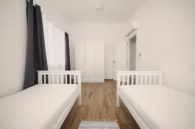 Krevet ili kreveti u jedinici u objektu Mango Tourist Apartment