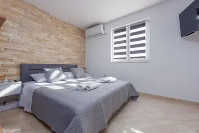 Krevet ili kreveti u jedinici u objektu Villa Izvor ZadarVillas