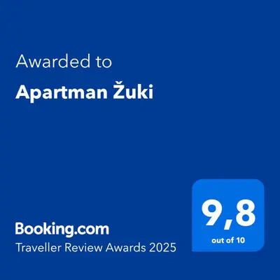 Certifikat, nagrada, logo ili neki drugi dokument izložen u objektu Apartman Žuki