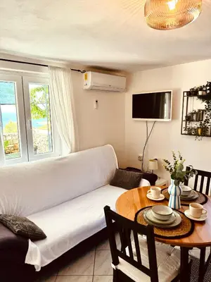 TV i/ili zabavni centar u objektu Apartments Lorena