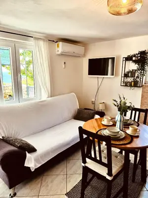 TV i/ili zabavni centar u objektu Apartments Lorena