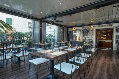 Restoran ili neka druga zalogajnica u objektu Pansion Kamenar 2