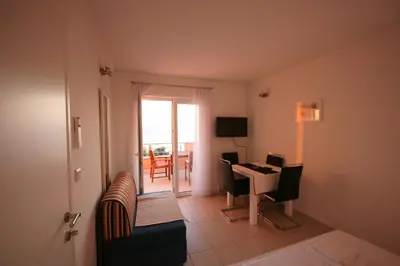 TV i/ili zabavni centar u objektu Apartments Villa Rosina