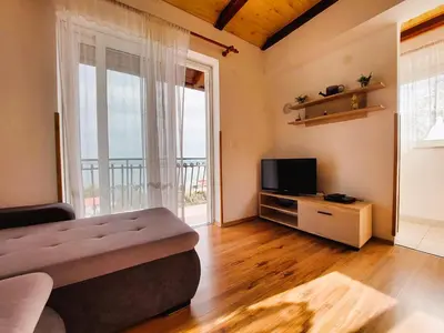 TV i/ili zabavni centar u objektu Bay Serenity apartments - Raslina