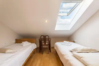 Krevet ili kreveti u jedinici u objektu Flores Luxury Suites-Rogoznica