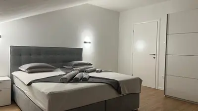 Krevet ili kreveti u jedinici u objektu Jednosobni apartman s pogledom na more