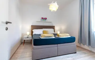 Krevet ili kreveti u jedinici u objektu Lovely Apartment In Sibenik