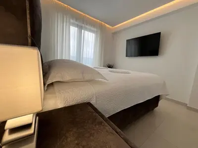 TV i/ili zabavni centar u objektu Primosten Sunhill Deluxe Apartment Maya
