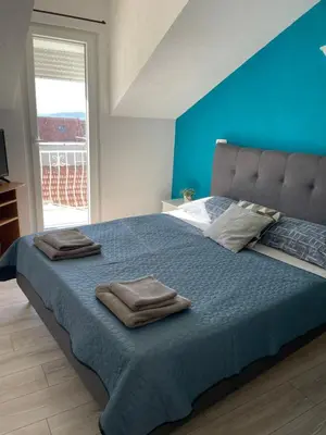 Krevet ili kreveti u jedinici u objektu Apartments Tina