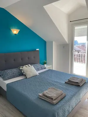 Krevet ili kreveti u jedinici u objektu Apartments Tina