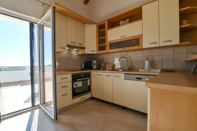 Kuhinja ili čajna kuhinja u objektu Holiday home Mia