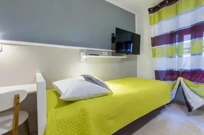 Krevet ili kreveti u jedinici u objektu Apartments and Rooms Villa Marija