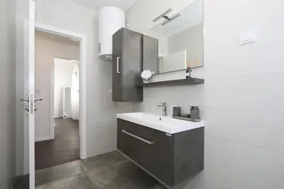 Kuhinja ili čajna kuhinja u objektu Apartments Anmalu with Jacuzzi
