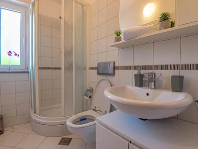 Kupaonica u objektu Holiday Home Paola by Interhome