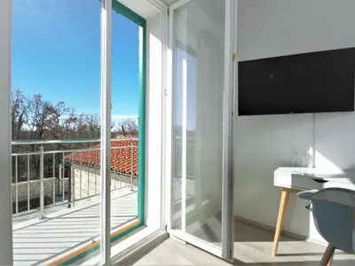 TV i/ili zabavni centar u objektu Holiday Home Skelin by Interhome