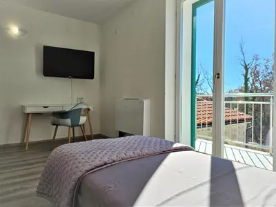TV i/ili zabavni centar u objektu Holiday Home Skelin by Interhome