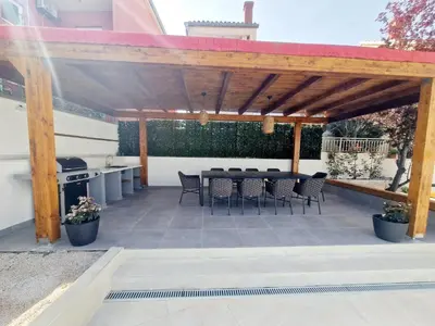 Popločani dio dvorišta ili vanjski dio objekta Villa Lumino