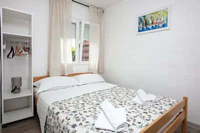 Krevet ili kreveti u jedinici u objektu Apartments with parking space Rogoznica - 22143