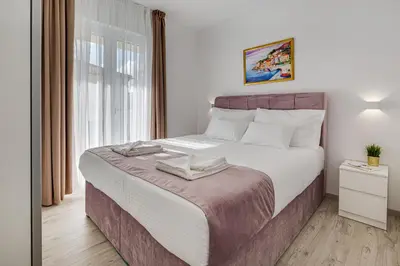 Krevet ili kreveti u jedinici u objektu Villa Corcovado Deluxe Apartments with Heated Pool