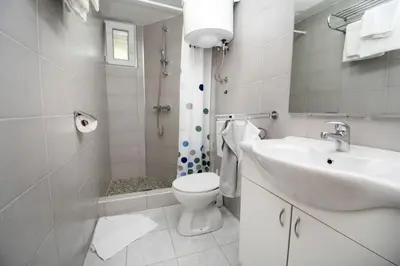 Kupaonica u objektu Apartments Maslina
