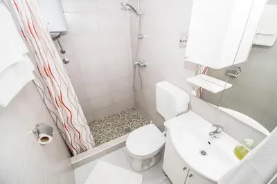 Kupaonica u objektu Apartments Maslina